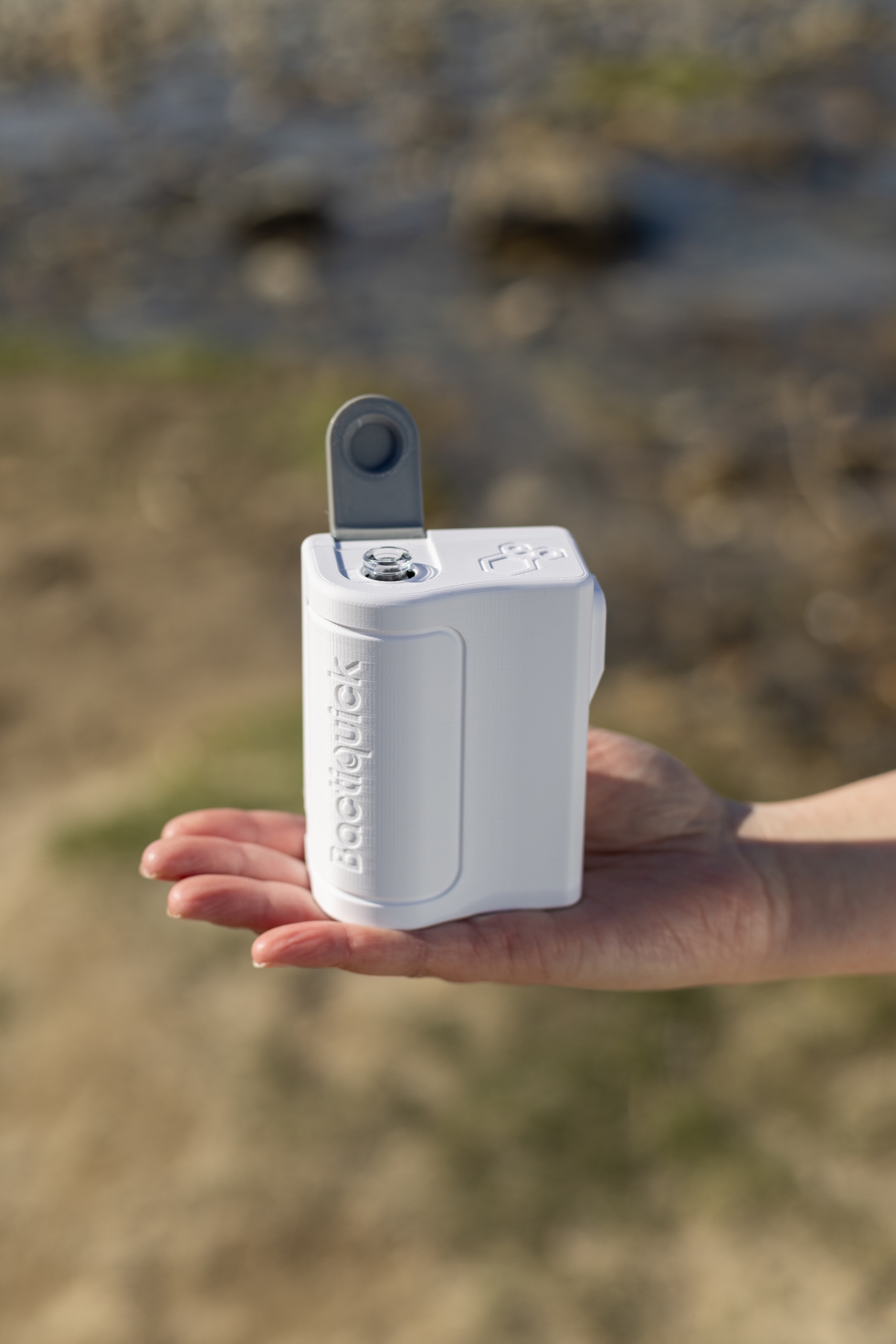 Portable Bactiquick Tester being used beside the water
